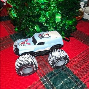 Blue and White Monster Truck Toy frosty the snow man